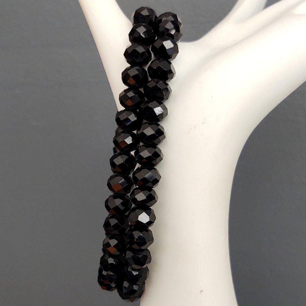 Pair of black glass stretch bracelets